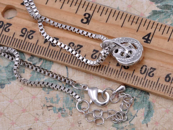 Swarovski Crystal Elements Aquamarine Bow Necklace Alilang Necklaces Swarovski Crystal Elements Aquamarine Bow Necklace Alilang Necklaces