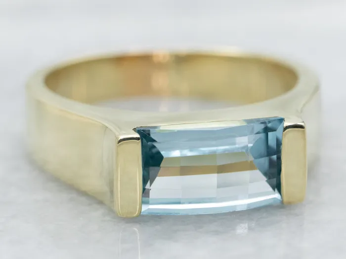 Market Square Jewelers Yellow Gold East to West Emerald Cut Blue Topaz Ring Rings Market Square Jewelers Yellow Gold East to West Emerald Cut Blue Topaz Ring Rings