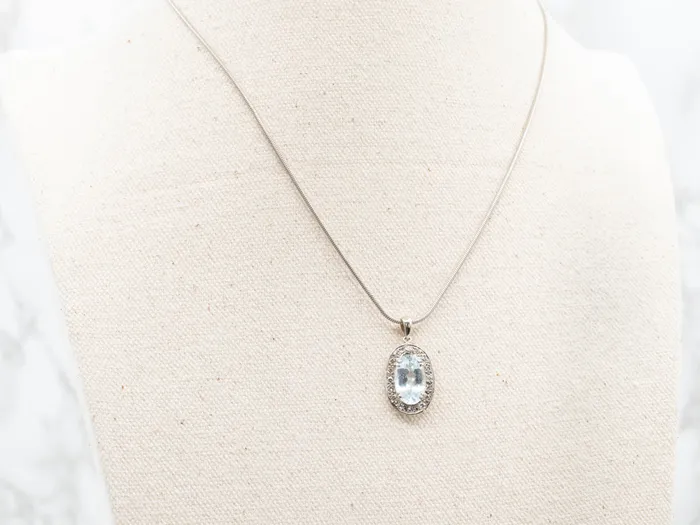 Necklaces Market Square Jewelers Alluring Blue Topaz and Diamond Halo Pendant Necklaces Market Square Jewelers Alluring Blue Topaz and Diamond Halo Pendant