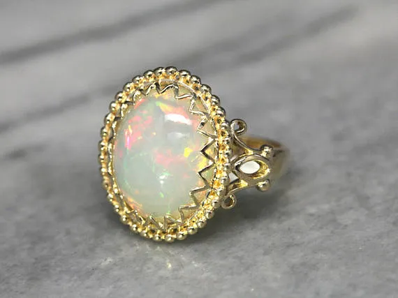 Ornate Vintage Opal Statement Ring in Yellow Gold Market Square Jewelers Rings Ornate Vintage Opal Statement Ring in Yellow Gold Market Square Jewelers Rings