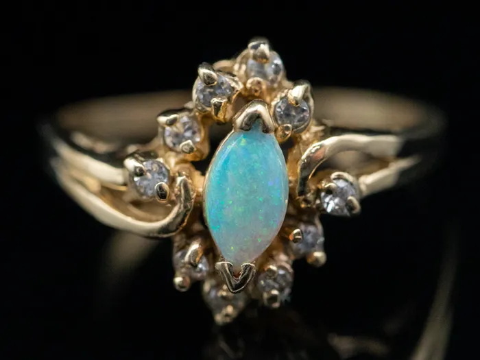 Rings Market Square Jewelers Marquise Cut Opal Ring with Diamond Halo