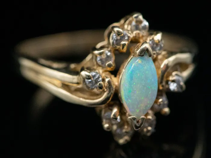 Rings Market Square Jewelers Marquise Cut Opal Ring with Diamond Halo Rings Market Square Jewelers Marquise Cut Opal Ring with Diamond Halo