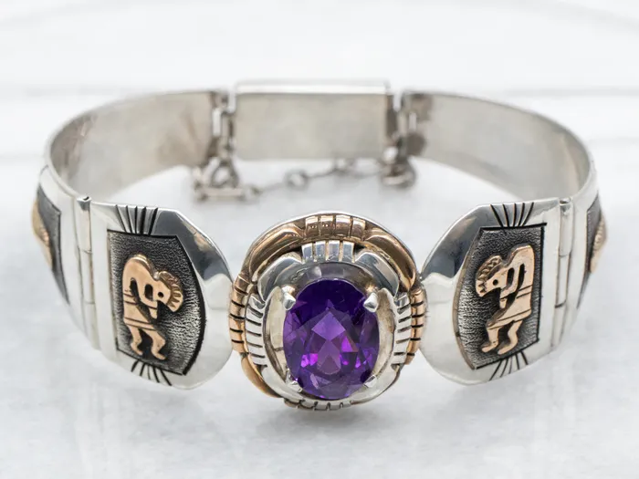 Sterling Silver and Gold Fill Amethyst Panel Link Bracelet with Native American Kokopelli Figures and Feathers Market Square Jewelers Bracelets Sterling Silver and Gold Fill Amethyst Panel Link Bracelet with Native American Kokopelli Figures and Feathers Market Square Jewelers Bracelets